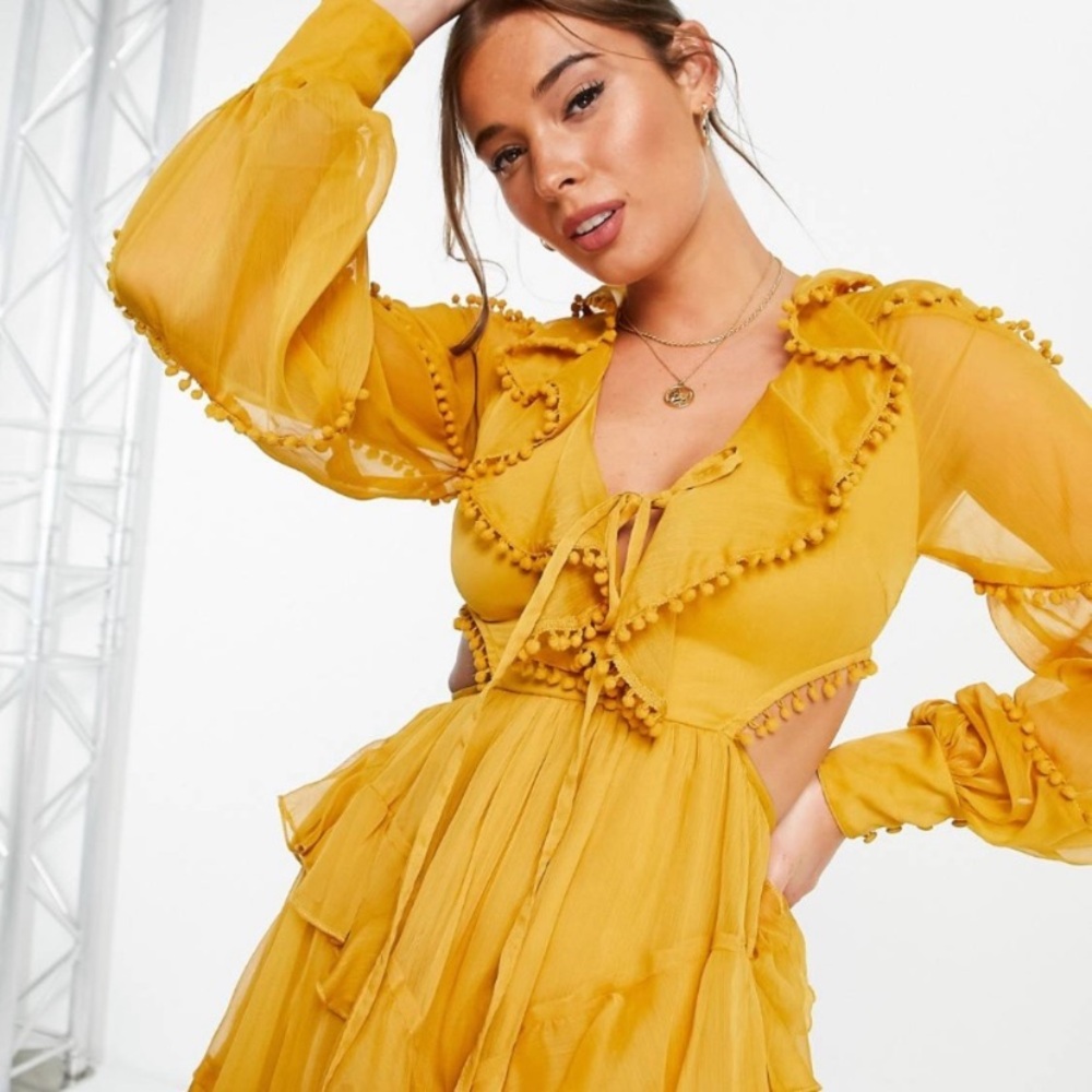 Beautiful mustard dress with tassel detailing and open cut style on sides - Picture 2 of 6